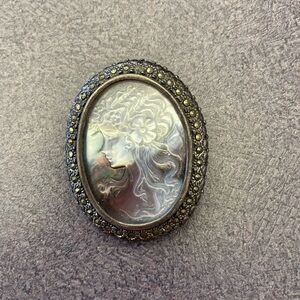 Vintage Cameo Brooch with Intricate Design